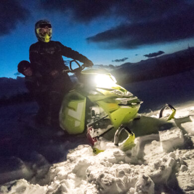 Alternative view of Northern lights snowmobile safari